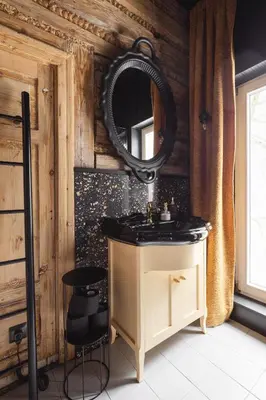 a bathroom with a sink and a mirror at Chata Patykowo in Myślenice
