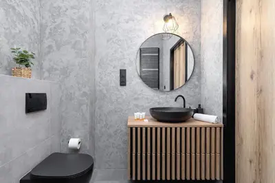 a bathroom with a sink and a mirror at Salsa Residence Pet-friendly by Noclegi Renters in Kraków