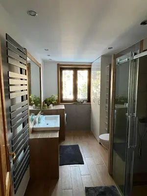 a bathroom with a sink and a shower at Domek do wynajęcia in Poręba Wielka