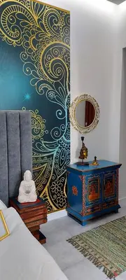 a bedroom with a bed and a mirror on a wall at JUWEL Apartments Kraków Indyjski ap 29 in Kraków