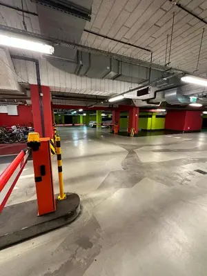 a brick building on a cobblestone street at Browar Lubicz- 5min walk to the Old Town, GARAGE in Kraków