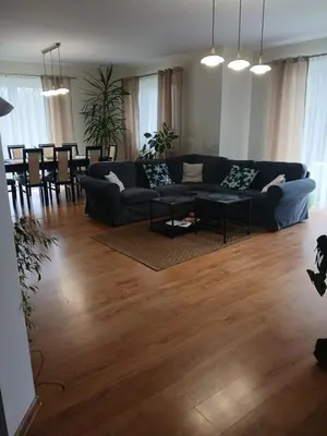 a living room with a couch and a table at Zielony Gaj in Gaj