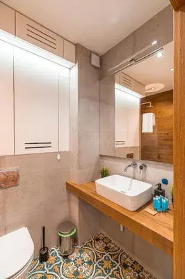 a bathroom with a sink and a toilet at Modlnica Wierzbowa Cosy Apartment by BookingHost in Kraków