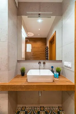 a bathroom with a white sink and a mirror at Modlnica Wierzbowa Cosy Apartment by BookingHost in Kraków