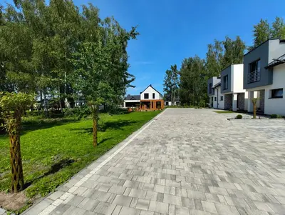 an empty driveway in front of a house at Domek Zielone Marzenie in Chrzanów