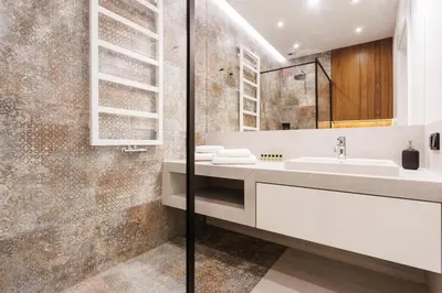 a bathroom with a sink and a mirror at City of the Kings-Julia Apartment in Kraków