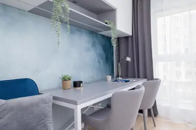 an office with a white desk and chairs at Vetulaniego Apartment with Air Conditioning & Parking by Renters Prestige in Kraków