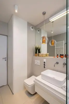 a bathroom with a sink and a toilet and a mirror at Vetulaniego Apartment with Air Conditioning & Parking by Renters Prestige in Kraków
