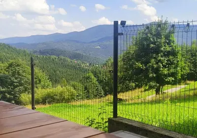 a view of a mountain view from a fence at Zawoja u Zbója in Zawoja