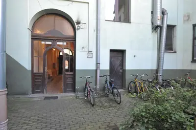 a group of bikes parked outside of a building at Old Town Sky Apartment in Kraków