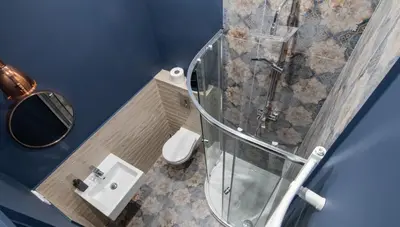 a bathroom with a shower and a toilet and a sink at Barbacan Suites - Old Town Apartments - by Upstairs in Kraków