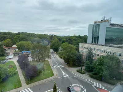 a view of a city street with a building at Apartament z widokiem na panoramę miasta in Kraków
