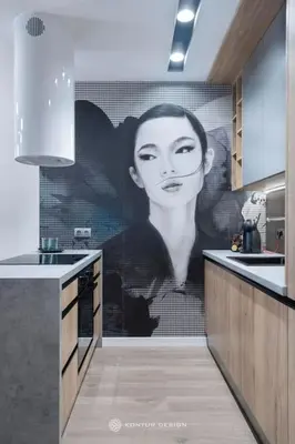 a mural of a woman on a wall in a kitchen at City of the Kings- Szafir in Kraków