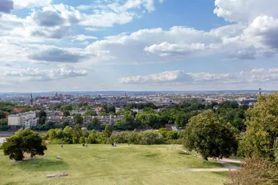 a view of a city from a park at Kopiec Kraka Podgórze with Parking by Noclegi Renters in Kraków