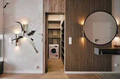 a bathroom with a mirror and a washing machine at Golden Dreams Luxury Apartment 81 in Kraków