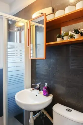 a bathroom with a sink and a toilet at Balcony Studio Krakow City Center & Old Town in Kraków