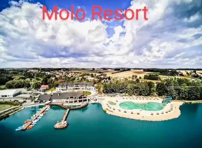 an aerial view of a moto resort on the water at Guest House close to Molo Resort in Osiek