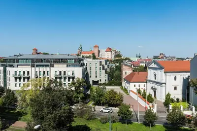 an aerial view of a city with buildings at WAWELOFT APARTMENT in Kraków