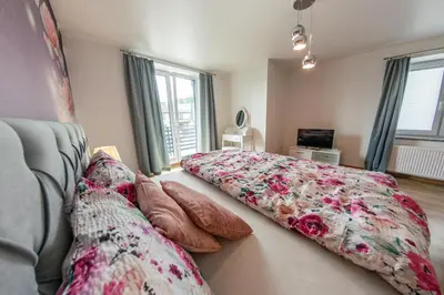 a bedroom with two beds and pillows on the floor at Willa Na Bystrej - Całoroczny dom na wynajem in Rabka-Zdroj