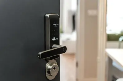 a close up of a black door with a handle at Quiet Courtyard Apartment near Old Town in Kraków