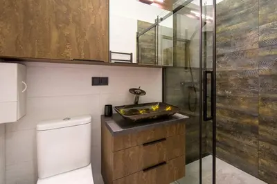 a bathroom with a sink and a toilet and a shower at Feel like home in Kraków in Kraków