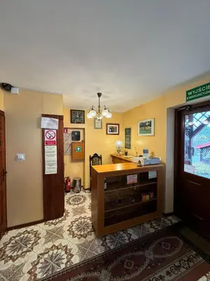 a room with a counter and a pharmacyacistacistacistacist at Galant Hotel in Wieliczka