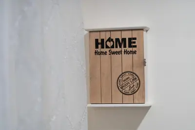 a wooden box with the words home sweet home at ŁOSOSINA 365 Dom z basenem in Łososina Dolna