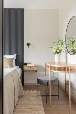 a bedroom with a table and a bed and a table and chair at River Side Residence 3/18 in Oświęcim