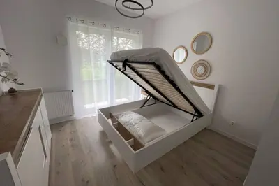 a bedroom with a bunk bed in a room at Malborska 29 in Kraków
