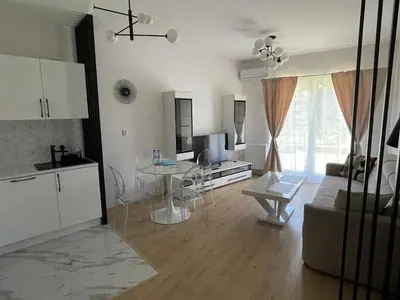 a living room with a couch and a table at Malborska 29 in Kraków