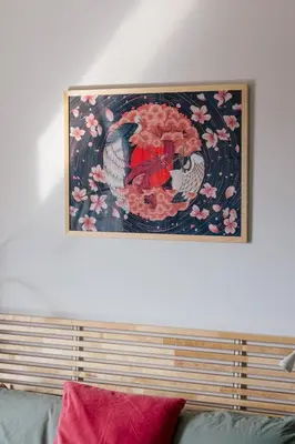 a painting on the wall above a couch at Nadwiślańska11 - Klimatyczny apartament tuż nad Wisłą in Kraków