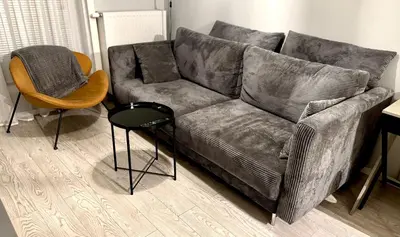 a living room with a couch and two chairs at Modern Apartament (10 min walk to Kazimierz) in Kraków