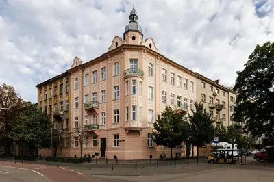 a large building with a tower on top of it at Wawel Castle View - City Center Suite - by Upstairs in Kraków