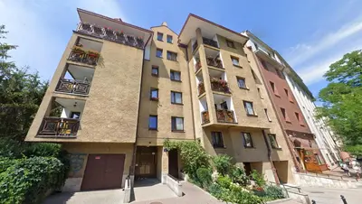 a tall building with balconies on the side of it at Z widokiem na Wisłę in Kraków