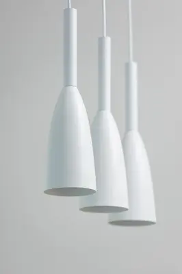 a row of white lights hanging from a ceiling at Modern Studio Kazimierz for 4 Guests only 1 km to Wawel Castle by Noclegi Renters in Kraków