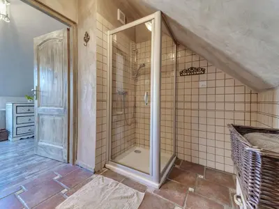 a bathroom with a shower with a glass door at Holiday Home Moja Mała Toskania by Interhome in Cisowa