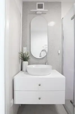 a white bathroom with a sink and a mirror at Beautiful & Cozy Apartment next to Main Market in Kraków