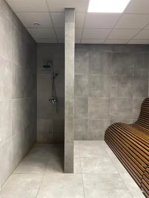 a bathroom with a shower in a room at Kątowa in Kraków