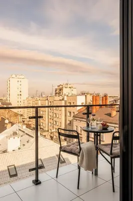 a balcony with a view of a city at Rooftop Apartment with Terrace by T in Kraków
