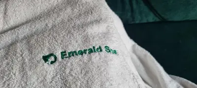 a white shirt with the word emeraldsaw on it at Emerald Spa Guest house in Kraków