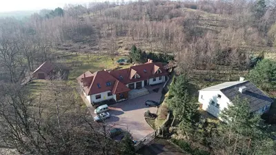 an overhead view of a large house with a driveway at Agroturystyka Podzamcze in Krzeszowice