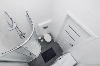 a bathroom with a glass shower and a toilet at NEW APARTMENT! Jewish quarter! in Kraków