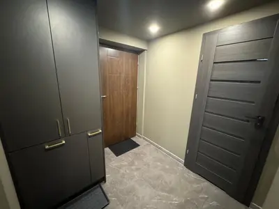 an empty room with a closet and a door at Studio Flat With a View in Kraków