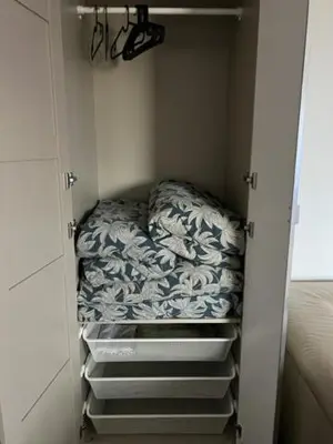 a small closet with a bed in it at Mieszkaj U Marty w GRÓDKU in Jaworzno