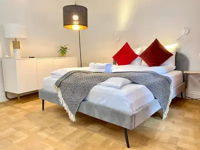 a bathroom with a sink and a shower at MINT Luxury Apartments at the Main Square in Kraków