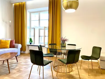 a bedroom with a large bed with at MINT Luxury Apartments at the Main Square in Kraków
