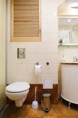 a bathroom with a toilet and a sink at Kraków Cosy 3 room 2 bathroom Old Town in Kraków