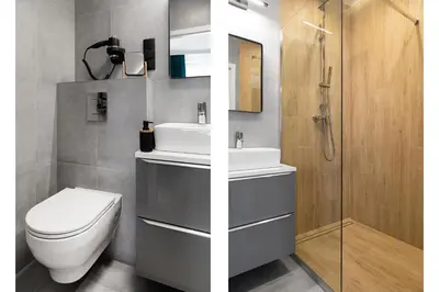a bathroom with a toilet and a sink and a shower at HOUSEHOST Apartments: Miodowa 42/12b Street in Kraków