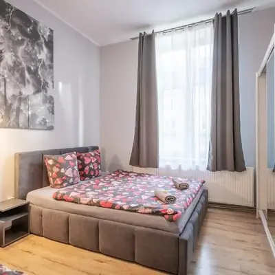 Queen Apartments
