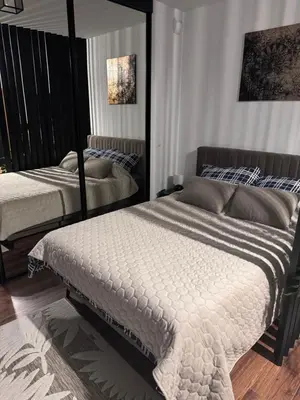 a bedroom with two beds in a room at Rydlowka 21 apartament in Kraków